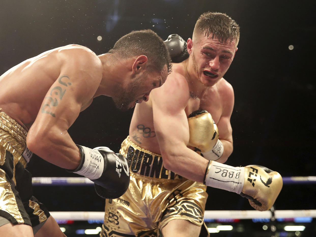 Ryan Burnett (R), shown here in action against Yonfrez Parejo on March 31, 2018, has agreed to take part in Season 2 of the World Boxing Super Series. (AP)