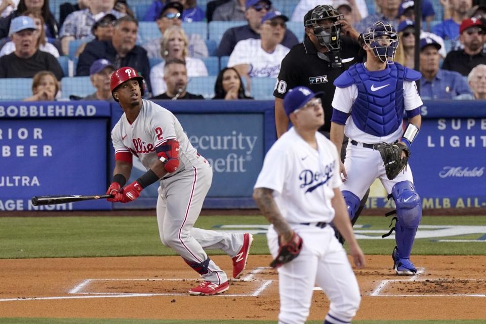 Philadelphia's Jean Segura hits a three-run home run off Dodgers starting pitcher Julio Urías in the first inning Saturday.