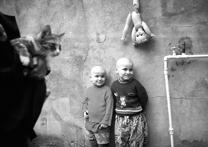 <p>“Refugees of Georgian Villages”: Sisters, Kaspi, Georgia, 2005. (© Natela Grigalashvili from “War Is Only Half the Story,” the Aftermath Project & Dewi Lewis Publishing) </p>