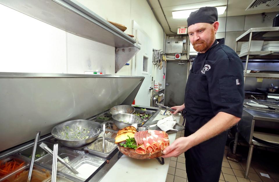 Executive chef Zachary Mims prepares a dish at Frappes Italian Grille in Ormond Beach, Thursday, July 8, 2021.