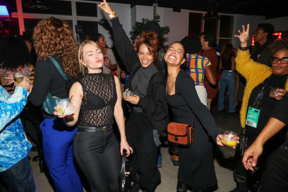 (L-R) AnnaSophia Robb, Leslie Grace, and Coral Pena toast with Ketel One Vodka at MIDNIGHT MACRO during the Sundance Film Festival on January 19, 2024 in Park City, Utah.
