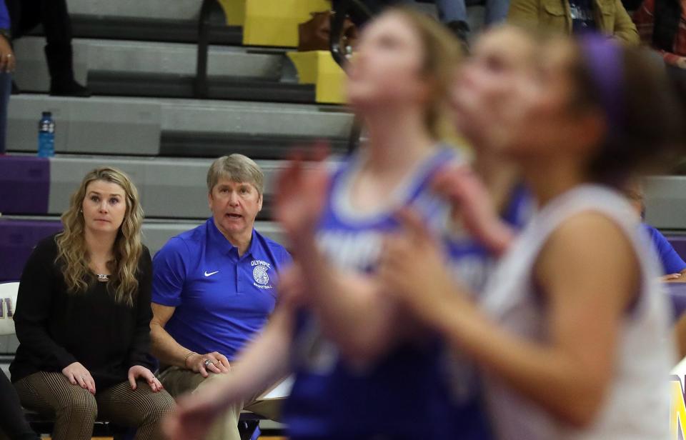 Olympic girls basketball coach Kelsey Callaghan and her father John Callaghan both played for South Kitsap in high school. John Callaghan won 304 games as South Kitsap's boys coach before stepping down in 2019.
