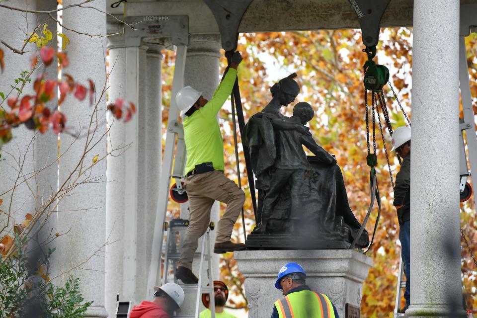 Crews began the process of removing the Confederate statues from the "Women of the Southland" monument in Jacksonville's Springfield Park early Wednesday morning after years of debate about the fate of the structure.