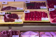 A fridge displaying beef labelled from Australia are on sale at a supermarket in Beijing, Tuesday, Nov. 24, 2020. China has stirred controversy with claims it has detected the coronavirus on packages of imported frozen food. (AP Photo/Andy Wong)