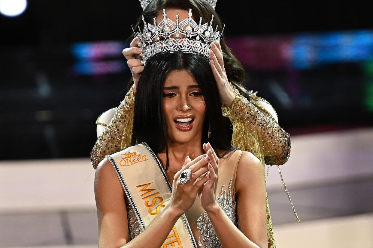 TOPSHOT - Transgender beauty pageant contestant Philippines' Fuschia Anne Ravena is crowned the winner of the 2022 Miss International Queen competition in Pattaya on June 25, 2022. (Photo by Manan VATSYAYANA / AFP) (Photo by MANAN VATSYAYANA/AFP via Getty Images)