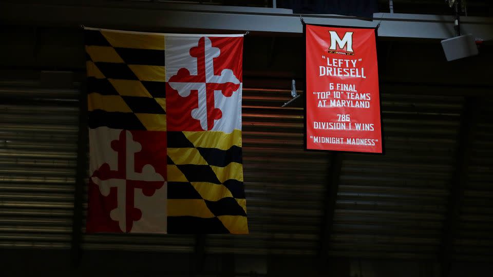 A banner honoring former Maryland men's basketball coach "Lefty" Driesell hangs from the rafters after being unveiled before an NCAA college basketball game between Maryland and Ohio State in 2017. - Patrick Semansky/AP