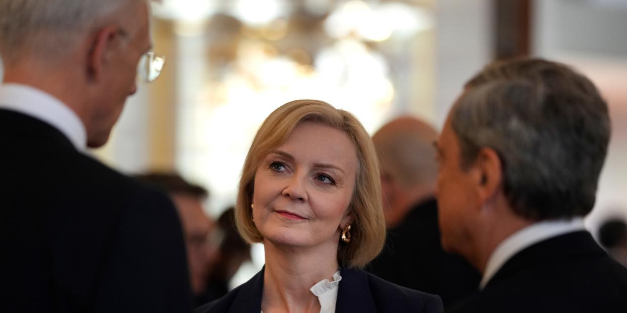 British Prime Minister Liz Truss speaks with Latvia's Prime Minister Krisjanis Karins and Italy's Prime Minister Mario Draghi during a meeting in Prague, Czech Republic.