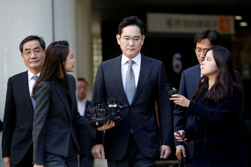 FILE PHOTO: Samsung Electronics Vice Chairman, Jay Y. Lee, leaves the Seoul high court in Seoul