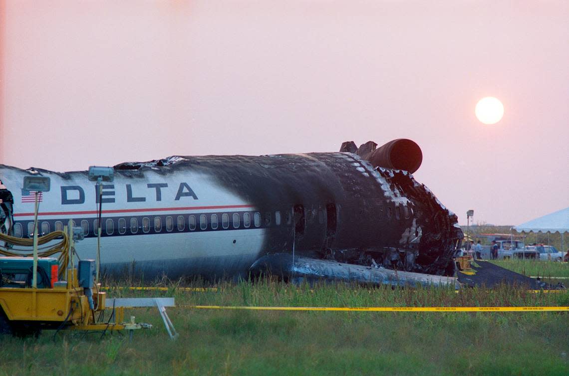Aug. 31, 1988: The sun begins to set over the wreckage of Delta 1141 at Dallas-Fort Worth International Airport.