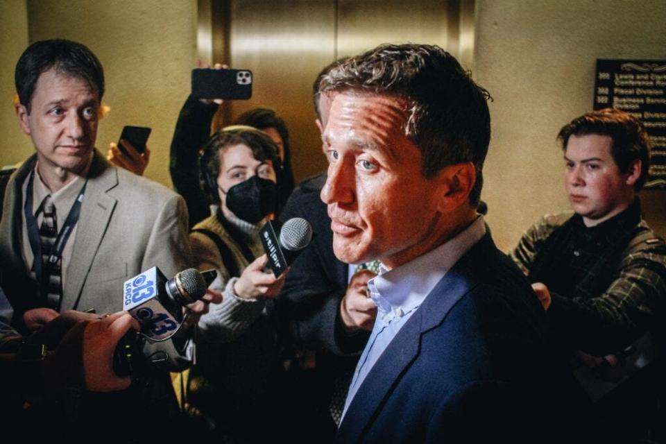 Former Missouri Gov. Eric Greitens declared Monday that he was "going RINO hunting," as the U.S. Senate candidate released a campaign video that depicted him breaking into a house surrounded by a military tactical team while holding a shotgun.