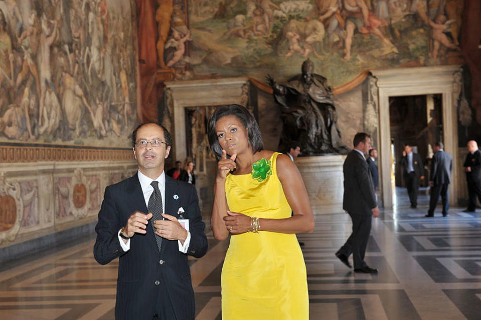 Michelle Obama visits the Capitole Hill in a chartreuse Wu. (Photo: Getty)