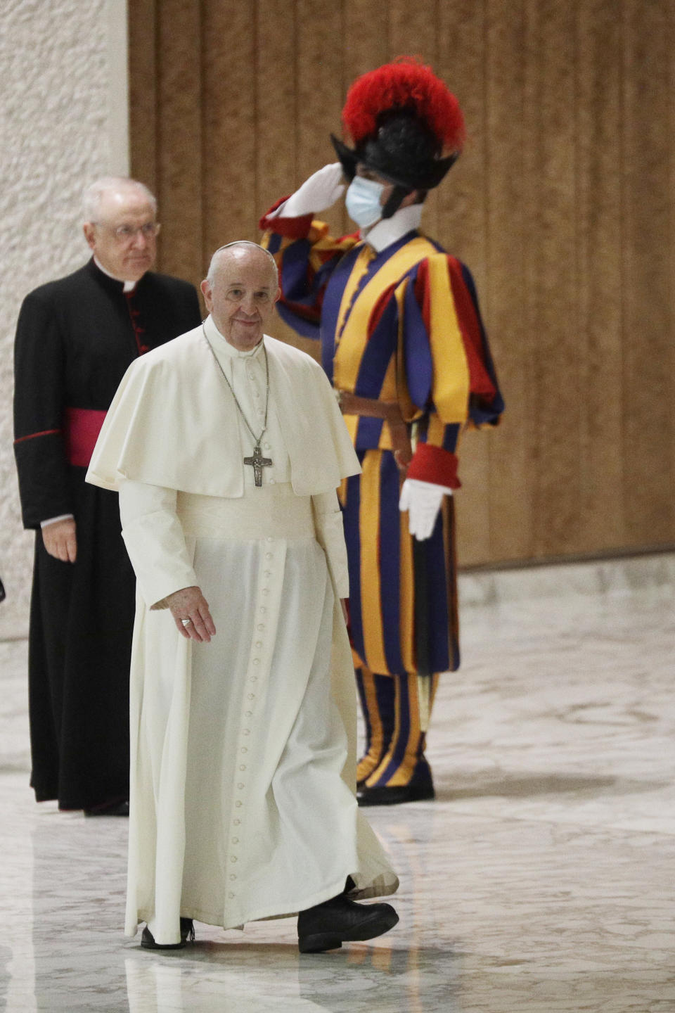 Pope Francis arrives in the Paul VI hall on the occasion of the weekly general audience at the Vatican, Wednesday, Oct. 21, 2020. (AP Photo/Gregorio Borgia)