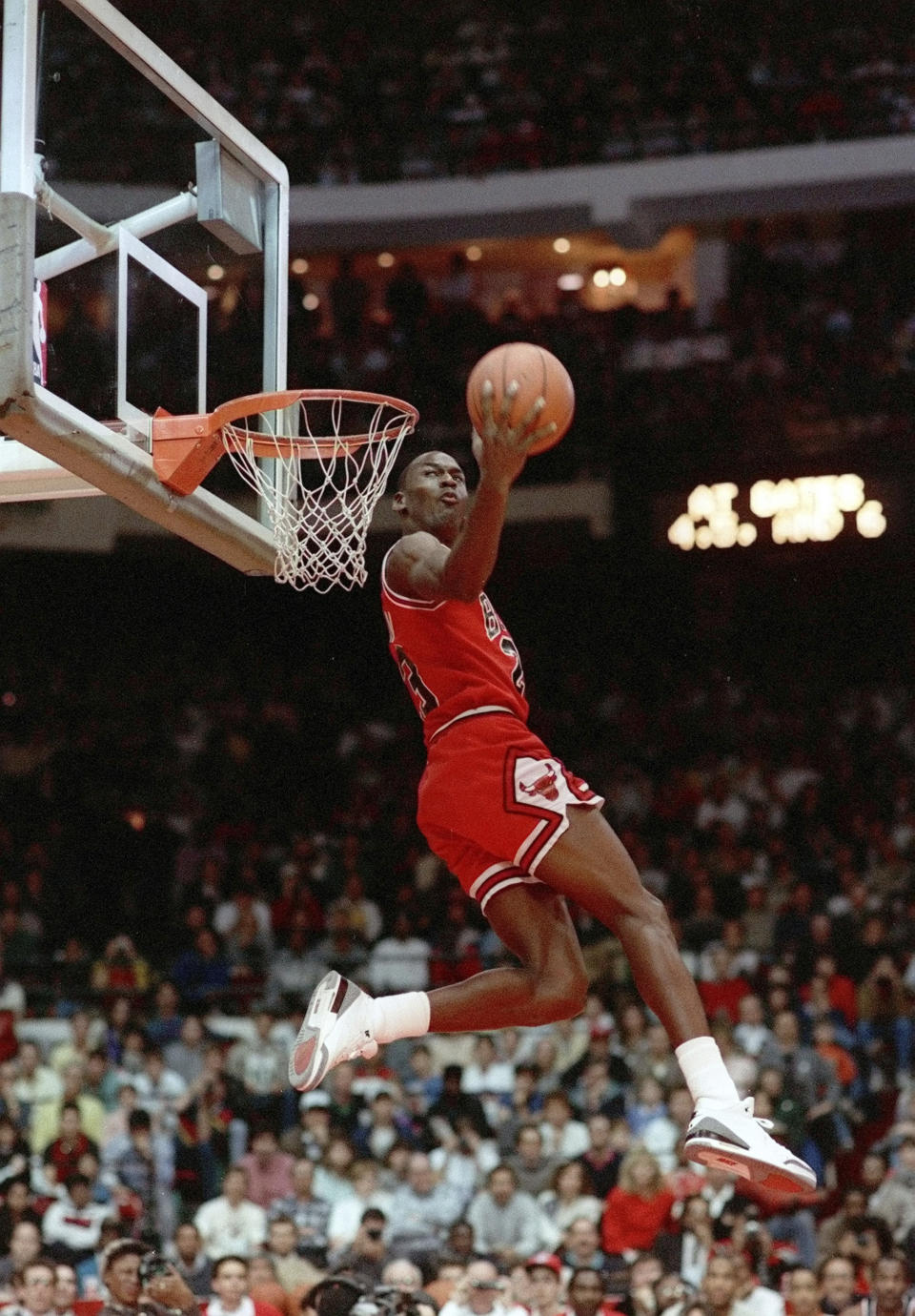 FILE - In this Feb. 6, 1988, file photo, Chicago Bulls' Michael Jordan dunks during the slam-dunk competition of the NBA All-Star weekend in Chicago. Jordan left the old Chicago Stadium that night with the trophy. To this day, many believe Wilkins was the rightful winner. (AP Photo/John Swart)