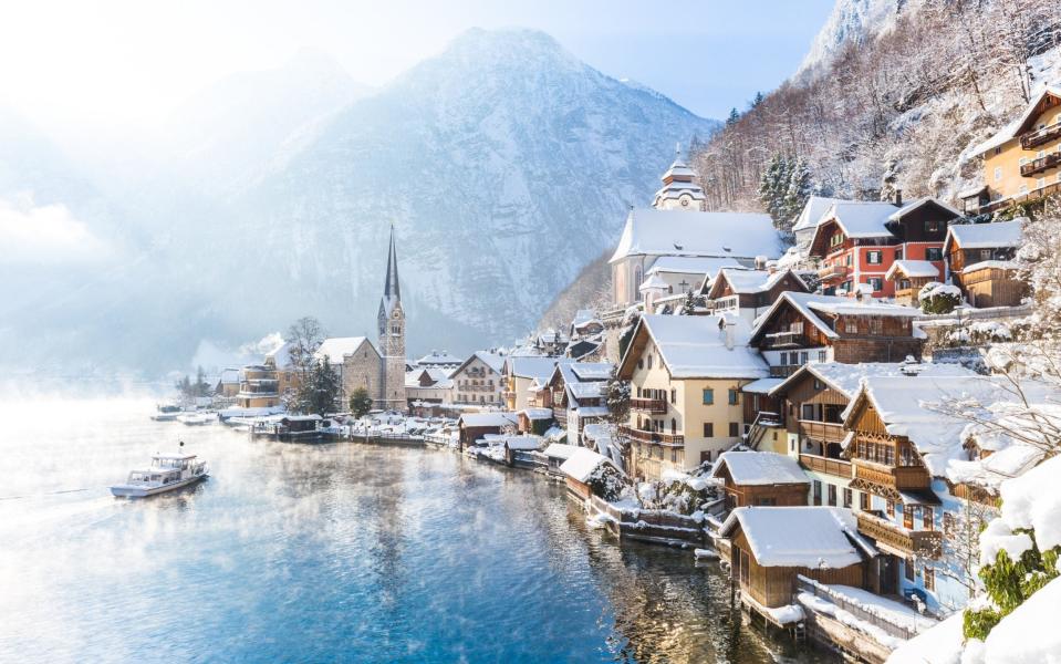 Postcard depicting the famous Hallstatt lakeside town in the Alps - iStockphoto