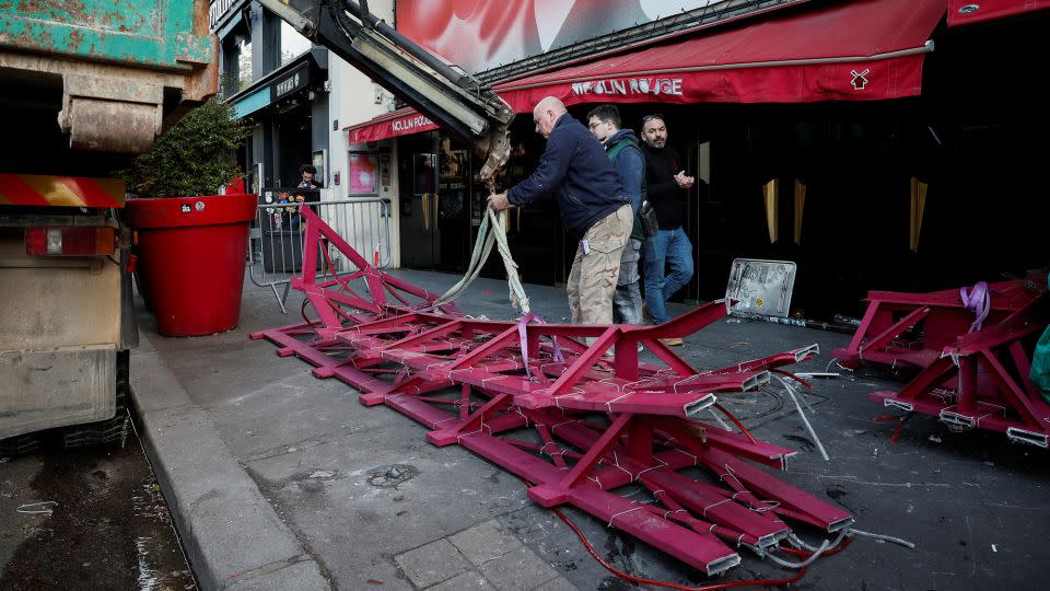 The broken sails of the Moulin Rouge's landmark red windmill. - Benoit Tessier/Reuters