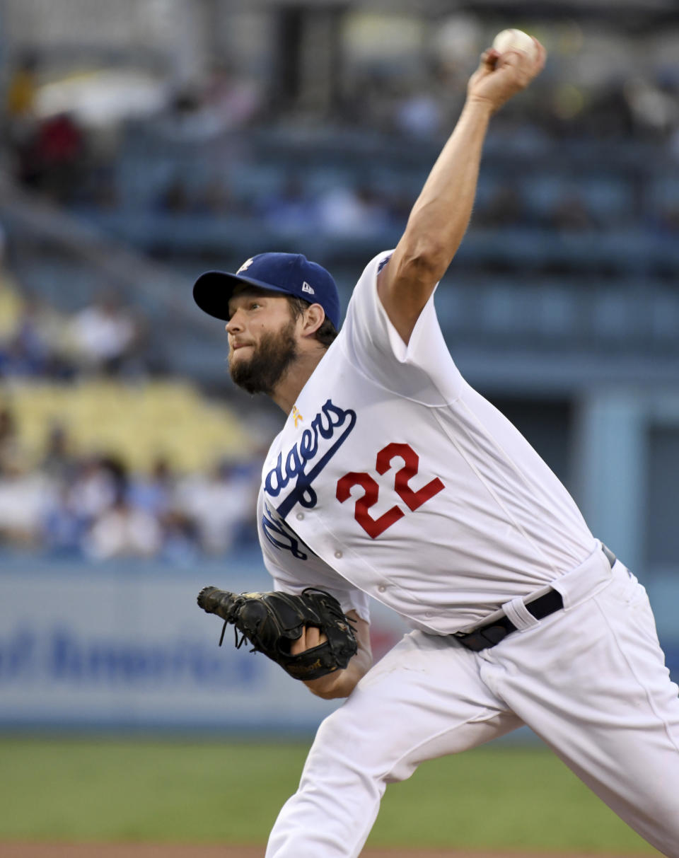 Los Angeles Dodgers pitcher Clayton Kershaw throws to the plate during the first inning of a baseball game against the Arizona Diamondbacks, Saturday, Sept. 1, 2018, in Los Angeles. (AP Photo/Michael Owen Baker)