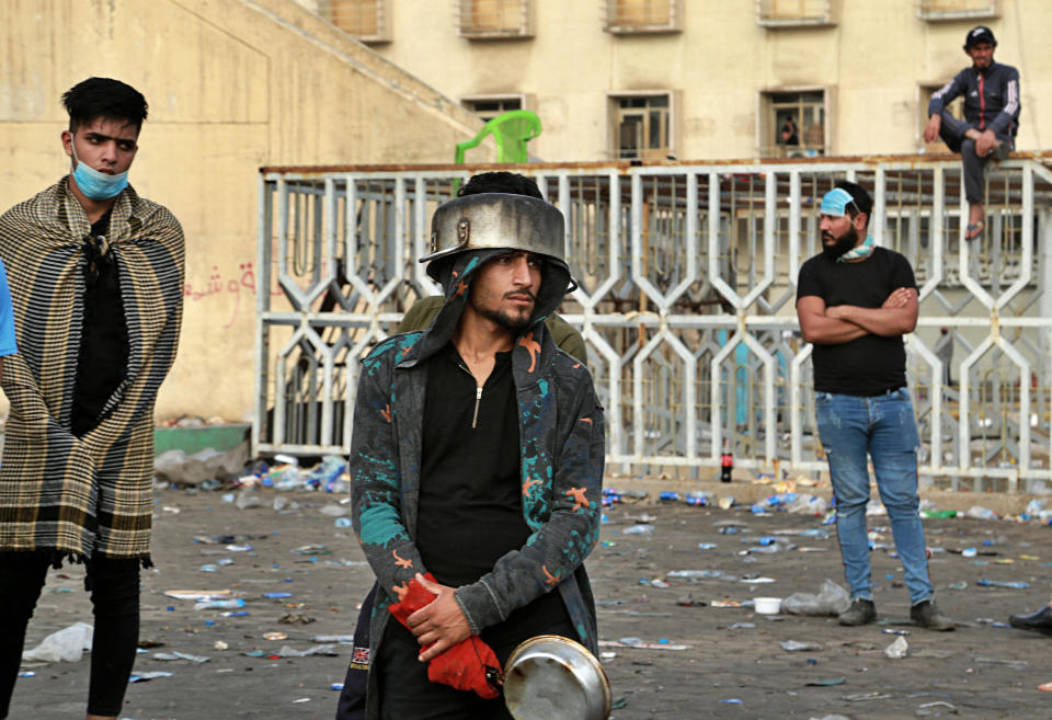 Anti-government protesters gather in Tahrir Square during a demonstration in Baghdad, Iraq, Sunday, Oct. 27, 2019. Protests have resumed in Iraq after a wave of anti-government protests earlier this month were violently put down. At least 149 people were killed in a week of demonstrations earlier in October. (AP Photo/Hadi Mizban)