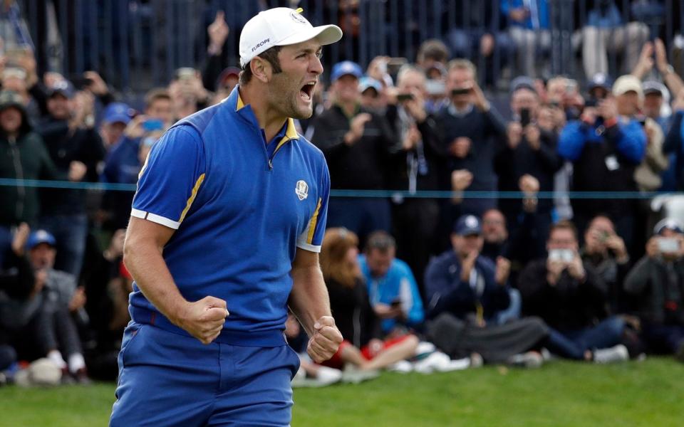 Jon Rahm celebrates beating Tiger Woods at the 2018 Ryder Cup in Paris - AP