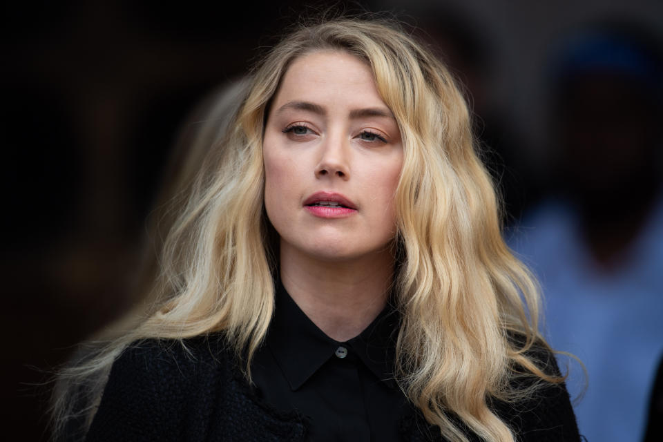 Actress Amber Heard gives a statement outside the High Court in London on the final day of hearings in Johnny Depp's libel case against the publishers of The Sun and its executive editor, Dan Wootton. Picture date: Tuesday July 28, 2020. Photo credit should read: Matt Crossick/Empics