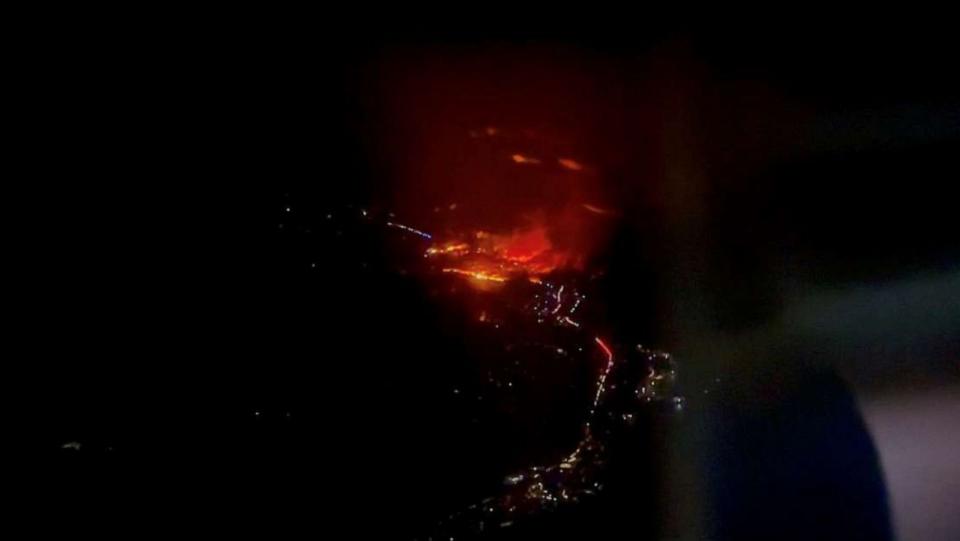 PHOTO: An aerial view shows a wildfire in Maui County, Hawaii, August 8, 2023 in this screen grab obtained from a social media video. (Justin Woo via Reuters)