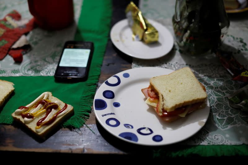 The sandwich of Anthony Vazquez from Venezuela is seen on a table in his relative house in Bogota