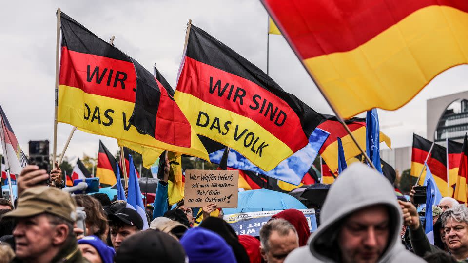 "We are the people," reads a flag at an AfD protest against the rising cost of living in October 2022. - Omer Messinger/Getty Images/File