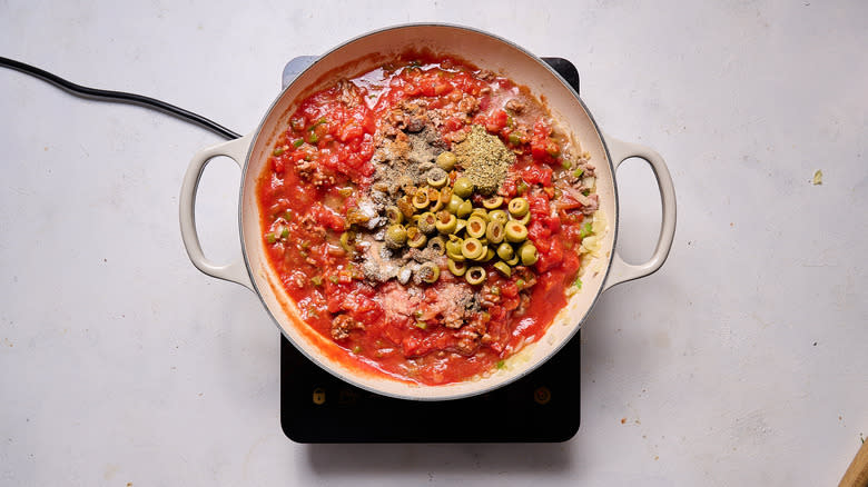 picadillo ingredients in skillet