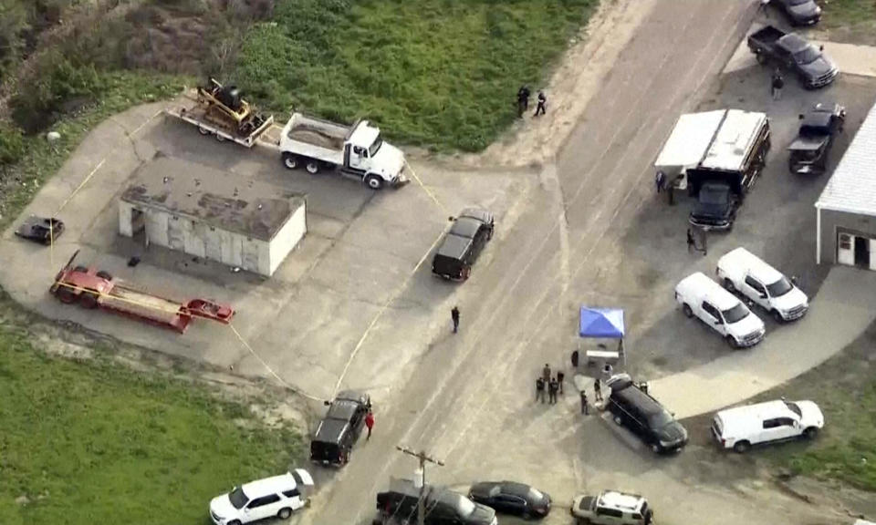 In this image taken from video provided by KTLA, law enforcement personnel work at the scene following an explosion during an indoor training exercise, Wednesday, March 13, 2024, in Irvine, Calif. An explosion during an indoor training exercise Wednesday sent 16 members of Southern California's Orange County Sheriff’s Department SWAT team to the hospital, with one person requiring surgery for a leg injury, the department said. (KTLA via AP)