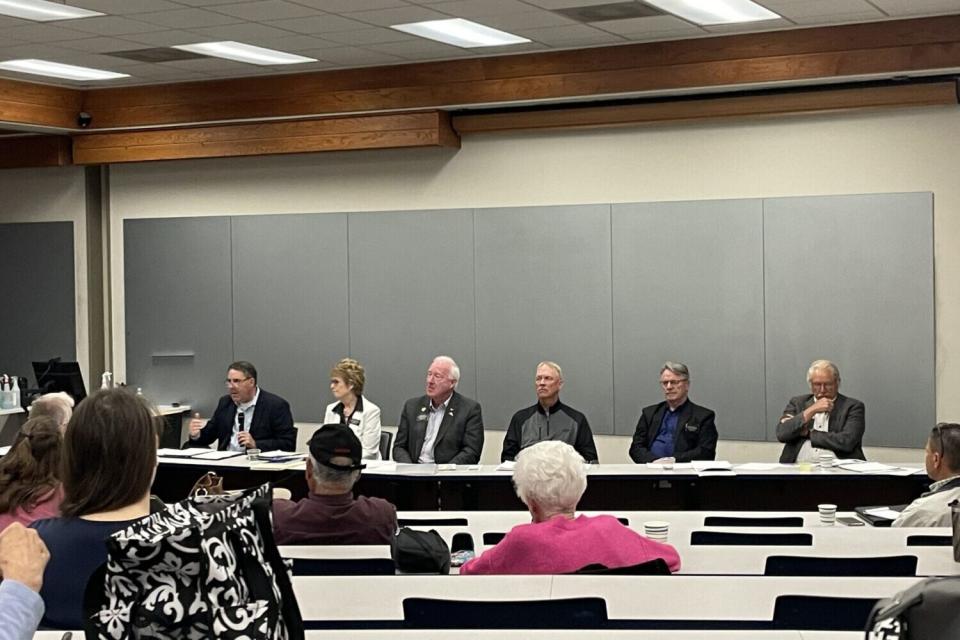 Participating in a public forum on property taxes April 20, 2024, at South Dakota Mines in Rapid City were, from left, Brookings real estate agent and lobbyist Matt Krogman, state Rep. Trish Ladner, R-Hot Springs, state Rep. Mike Derby, R-Rapid City, Hot Springs businessman Donald Olstad, state Rep. Dennis Krull, R-Hill City, and Pennington County Commissioner Ron Rossknecht. (Seth Tupper/South Dakota Searchlight)