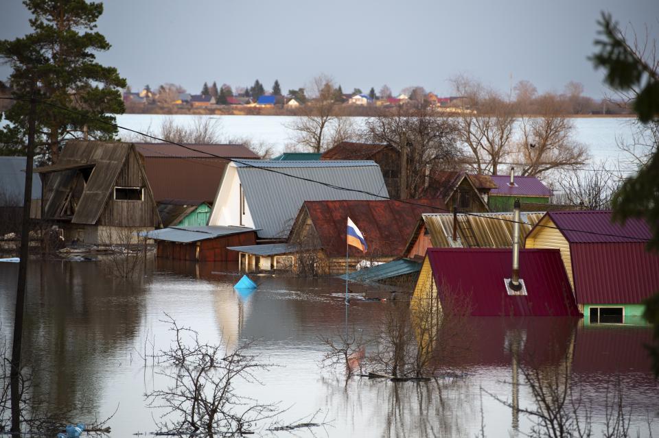 A view of a flooded area in Ishim, Tyumen region, 1968 km (1230 miles) east of Moscow, Russia, on Sunday, April 21, 2024. The situation with floods in Russia's Tyumen Region remains tense, with the level of water in the Ishim River having exceeded 10.5 meters, (AP Photo/Sergei Rusanov)