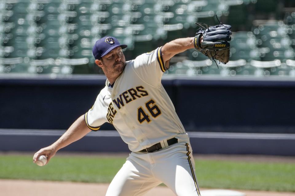 Milwaukee Brewers' Corey Knebel throws during a practice session Monday, July 13, 2020, at Miller Park in Milwaukee. (AP Photo/Morry Gash)