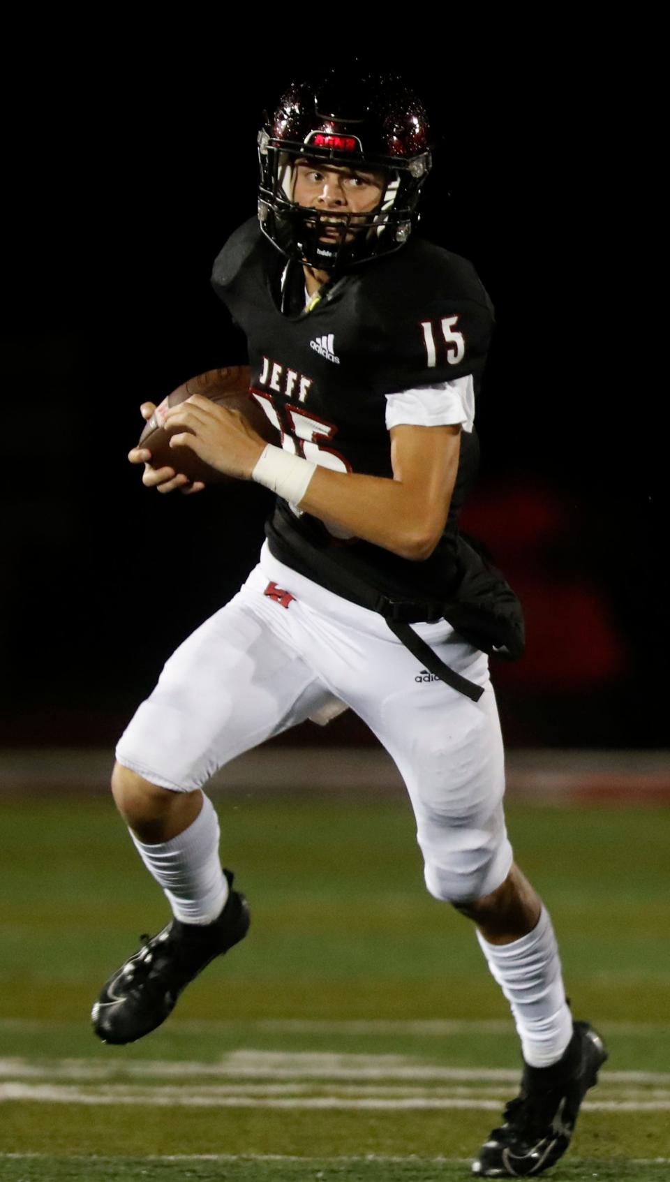 Lafayette Jeff Bronchos quarterback Ethan Smith (15) rushes with the ball during the IHSAA football game against the Harrison Raiders, Friday, Sept. 23, 2022, at Scheumann Stadium in Lafayette, Ind. Harrison won 34-27.