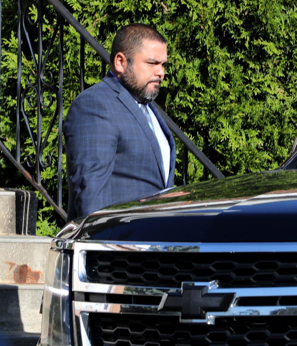 Elmsford police officer Doug Ramirez leaves the village court in Elmsford after being arraigned, Sept. 27, 2023.