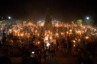 <p>Neo-Nazis, Alt-Right, and White Supremacists encircle counter protestors at the base of a statue of Thomas Jefferson after marching through the University of Virginia campus with torches in Charlottesville, Va., on Aug. 11, 2017. (Photo: Zach D Roberts/NurPhoto via Getty Images) </p>