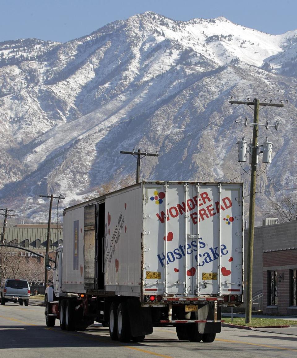 A Hostess Wonder Bread truck is parked in front of the Utah Hostess plant in Ogden, Utah, Thursday, Nov. 15, 2012. Hostess Brands Inc. is warning striking employees that it will move to liquidate the company if plant operations don't return to normal levels by Thursday evening. The maker of Twinkies, Ding Dongs and Wonder Bread said Thursday it will file a motion in U.S. Bankruptcy Court to shutter operations if enough workers don't return by 5 p.m. EST. That would result in the loss of about 18,000 jobs, including hundreds in Ogden. (AP Photo/Rick Bowmer)