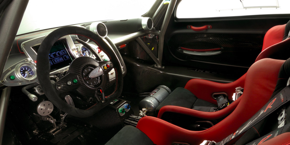 <p>All Pagani steering wheels are beautiful, but <a href="https://www.caranddriver.com/news/a15148412/pagani-zonda-r-auto-shows-1/" rel="nofollow noopener" target="_blank" data-ylk="slk:the Zonda R's;elm:context_link;itc:0;sec:content-canvas" class="link ">the Zonda R's</a> unit is by far the most interesting. It has the tachometer <em>in the center of the wheel</em> rather than in the digital gauge cluster. How cool is that?</p>