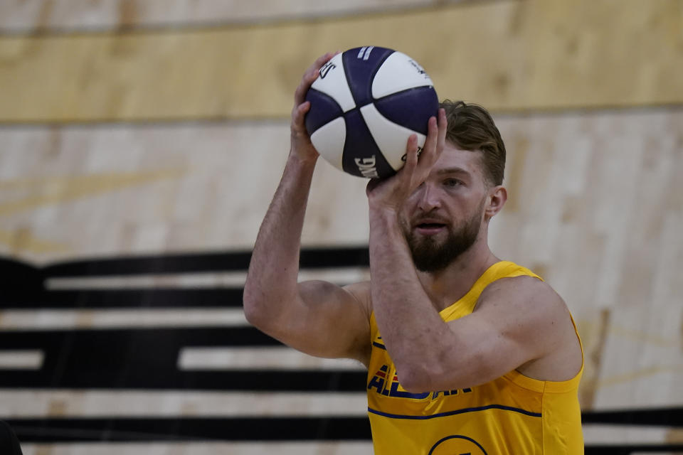 Indiana Pacers forward Domantas Sabonis shoots during the skills challenge portion of basketball's NBA All-Star Game in Atlanta, Sunday, March 7, 2021. (AP Photo/Brynn Anderson)