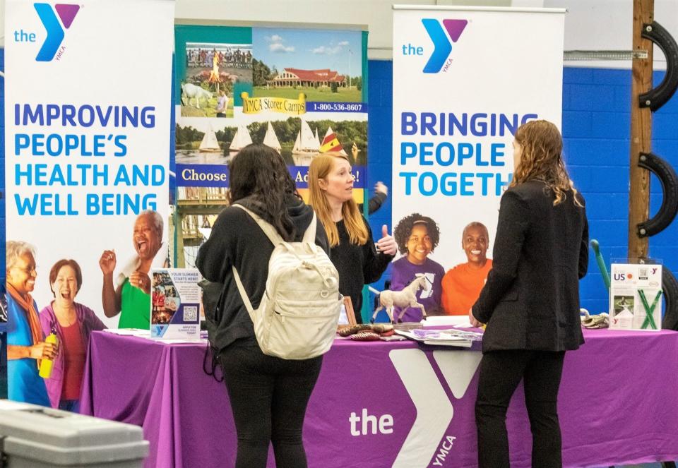 Local high school students listened to employers pitch various career options, like those at the Frank and Shirley Dick Family YMCA, during the Career Connections job fair hosted March 22 at the Siena Heights University fieldhouse in Adrian and conducted by Lenawee Now and the Align Center for Workforce Development.
