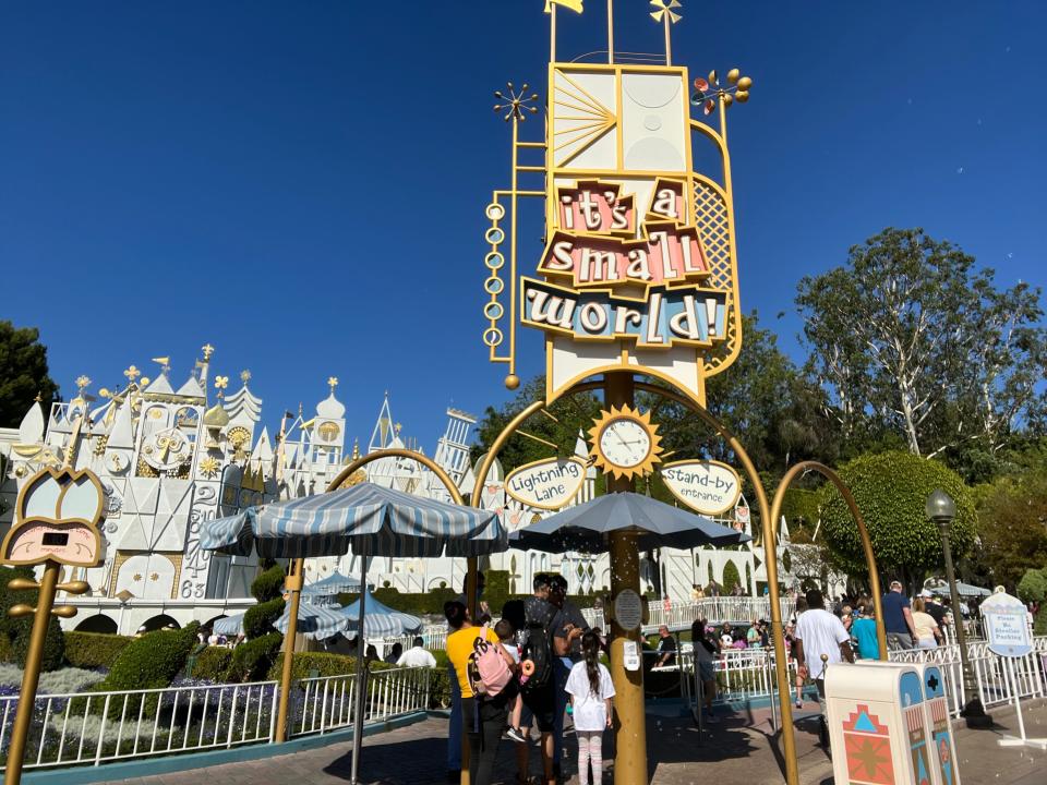 queue for its a small world at disneyland