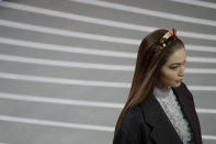 Model Gigi Hadid wears a creation part of the Prada women's Fall-Winter 2020-2021 collection, that was presented in Milan, Italy, Thursday, Feb. 20, 2020. (AP Photo/Luca Bruno).