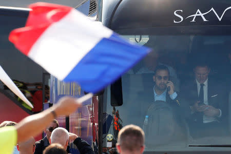 FILE PHOTO: Soccer Football - World Cup - The France team return from the World Cup in Russia - Charles de Gaulle Airport, Paris, France - July 16, 2018. Alexandre Benalla, French presidential aide for security, rides on the team bus. REUTERS/Pascal Rossignol