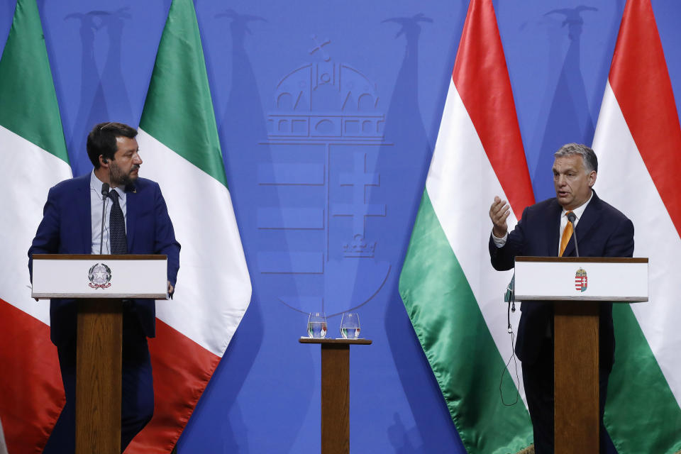 Italian Deputy Prime Minister and Minister of Interior Matteo Salvini, left, listens to Hungarian Prime Minister Viktor Orban during their joint press conference in the PM's office in Budapest, Hungary, Thursday, May 2, 2019. (Szilard Koszticsak/MTI via AP)