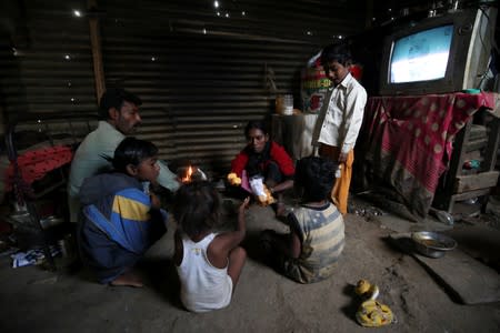 The Wider Image: The Indian children who take a train to collect water