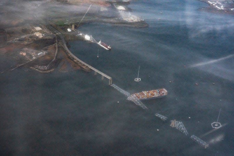 BALTIMORE, MD- March 26: The scene where a container ship crashed into the Francis Scott Key Bridge in Baltimore, MD on March 26, 2024. - Photo: Photo by Carolyn Van Houten (Getty Images)