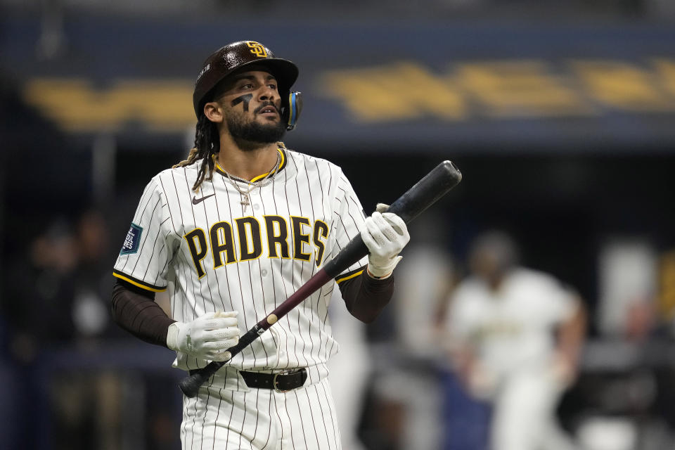 San Diego Padres' Fernando Tatis Jr. heads to first as he flies out during the eighth inning of an opening day baseball game against the Los Angeles Dodgers at the Gocheok Sky Dome in Seoul, South Korea Wednesday, March 20, 2024, in Seoul, South Korea. (AP Photo/Lee Jin-man)