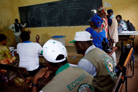 ECOWAS members attend the counting of the ballots during a run-off presidential election in Bamako, Mali August 12, 2018. REUTERS/Luc Gnago