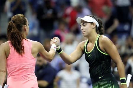 Sep 5, 2016; New York, NY, USA; Ana Konjuh of Croatia (R) shakes hands with Agnieszka Radwanska of Poland (L) after their match on day eight of the 2016 U.S. Open tennis tournament at USTA Billie Jean King National Tennis Center. Geoff Burke-USA TODAY Sports