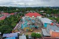 An aerial picture shows a hospital building collapsed following an earthquake in Mamuju