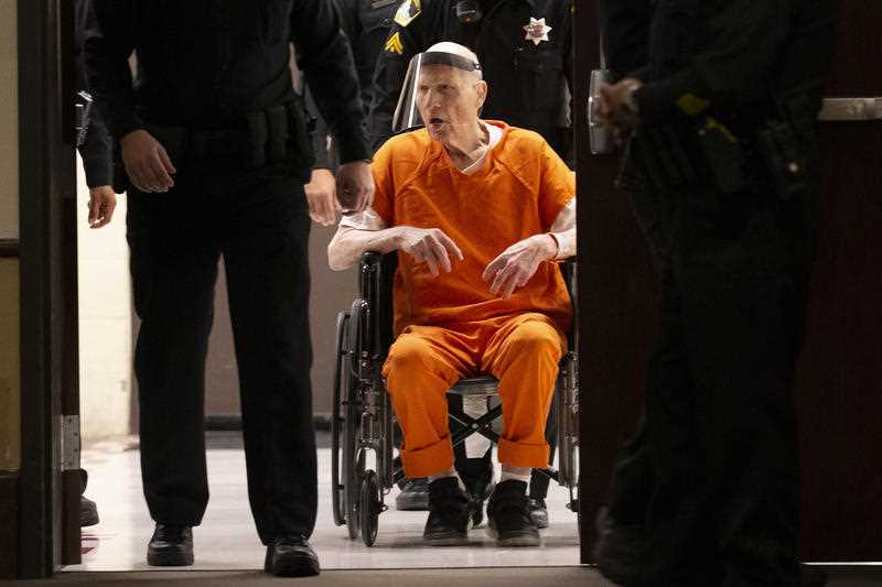 Sacramento County Sheriff's Deputies use a wheelchair to bring Joseph James DeAngelo into the courtroom in Sacramento Superior Court in Sacramento