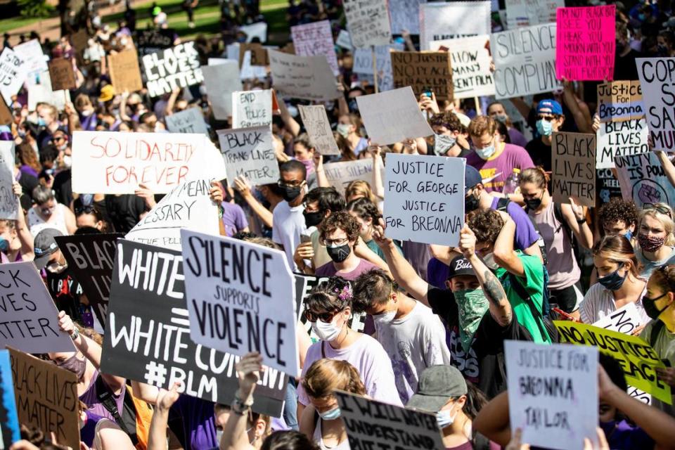 Protesters march on the campus of The University of North Carolina during a protest against white supremacy, sparked by the death of George Floyd in Minneapolis, a black man who was killed by a white police officer, in Chapel Hill, N.C. on Friday, June 5, 2020.